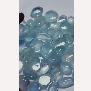 พลอยโทแพซสีฟ้าธรรมชาติ 60 เม็ด ขนาด 16 มม. ถึง 25 มม. รูปทรงวงรีแบบคาโบชอง น้ำหนัก 1500 กะรัต แบบหลังแบน Iroc Sales พลอยหลวมคุณภาพสูง - Product Image 4