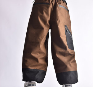 Pantalon de neige imperméable marron et noir avec doublure chaude en polaire bicolore taille élastique et ourlet cintré pour plus de confort - Product Image 1