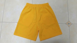 Shorts jaunes unis à taille élastique, coupe régulière unisexe, pour l'été - Product Image 1