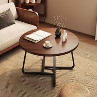 Ensemble de tables basses rondes empilables pour gagner de la place, plateau en bois de noyer avec base croisée en métal noir industriel pour petit appartement