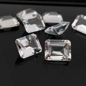 โทแพซสีขาวธรรมชาติทรงแปดเหลี่ยมเจียระไนแบบเหลี่ยมเพชรพลอย  ขนาดมาตรฐาน  พร้อมใบรับรอง  ไม่ผ่านการปรับแต่ง  พร้อมสำหรับการฝังในเครื่องประดับ - Product Image 4