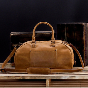 กระเป๋าหนังแท้แบบ unisex สไตล์วินเทจ กระเป๋าเดินทางสุดสัปดาห์ ความจุขนาดใหญ่ ใช้งานได้หลากหลาย กระเป๋าถือขึ้นเครื่องพร้อมซิป - Product Image 1