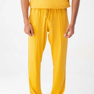 Pantalon décontracté plissé jaune pour homme avec cordon de serrage, léger, respirant, coupe ample, en polyester tricoté, idéal pour l'été - Product Image 1