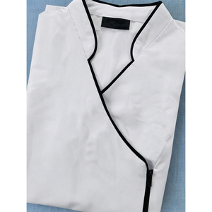 Tunique d'uniforme de spa pour femme, col asymétrique, vêtement de travail pour esthéticienne, salon de beauté, coiffeuse, avec passepoil contrastant, vente en gros personnalisée - Product Image 4