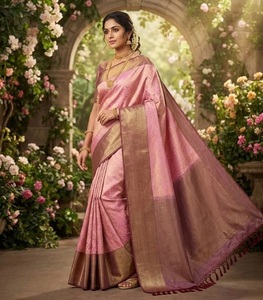 Soft <b>Blush</b> Pink and Brown Woven Silk Saree with Subtle Traditional Motifs Perfect for Bridal Festive and Party Occasions - Product Image 1