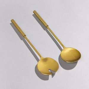 Cuillère à salade en métal au design ergonomique innovant pour une prise en main confortable, idéale pour les buffets, la restauration et le service de table en restaurant. - Product Image 1