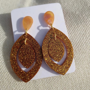 Boucles d'oreilles en résine pour vendeurs en ligne, qualité e-commerce, finition lisse, prix d'usine en gros - Product Image 1
