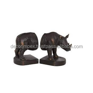 Este estilo específico de los sujetalibros T-Rex se asocia a menudo con la marca Design Toscano, conocida por su historia. - Product Image 3