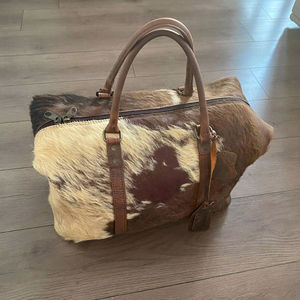 กระเป๋าหนังแท้ทรงดัฟเฟิล หนังวัวแท้ สไตล์วินเทจ ซิปปิด กระเป๋าเดินทางพกพาสะดวก ความจุขนาดใหญ่ ทำด้วยมือ ทนทาน - Product Image 1