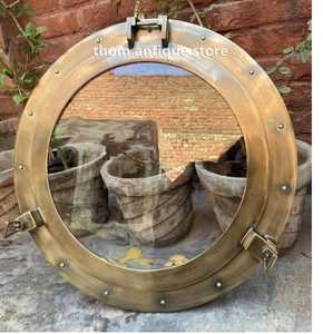 Miroir circulaire en laiton plaqué or style antique pour décoration intérieure - Product Image 1
