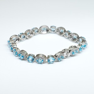 Premium 925 <b>Sterling</b> <b>Silver</b> Rhodium Plated Aqua Gemstone Tennis <b>Bracelet</b> with Dazzling CZ Curved Halo Settings for <b>Women</b> - Product Image 1