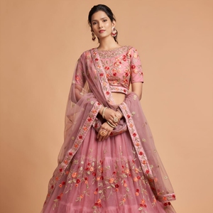 Designer Soft <b>Net</b> Lehenga Choli Set with Thread Zari Dori and Badla Embroidery Work is an elegant ethnic ensemble crafted - Product Image 1