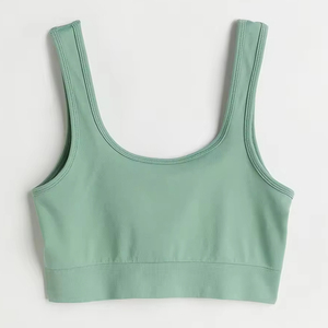 Sujetador deportivo verde menta con tirantes anchos y dobladillo acanalado para mujer, ideal para gimnasio, fitness, entrenamiento y running. Disponible para venta en línea. - Product Image 1