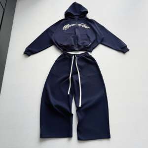 OEM ODM Pull à capuche zippé ample et long en coton 100% uni respirant pour hommes et femmes, personnalisé et brodé - Product Image 2