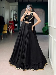 Elegancia de diseñador en una tela ligera con bordado de loto y una elegante chaqueta larga lista para usar como lehenga para Navratri. - Product Image 5