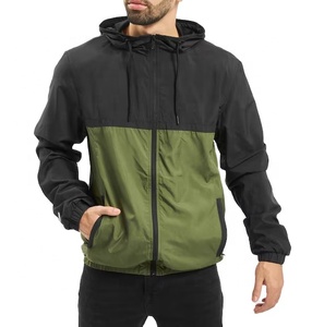 Chaqueta cortavientos ligera con forro de malla y capucha para hombre, ideal para senderismo y camping al aire libre. - Product Image 1