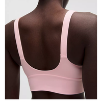 Ensemble de yoga rose sans couture pour femme, composé d'un crop top à col rond et d'un short taille mi-haute, avec soutien-gorge de sport convertible à bretelles en Spandex/Nylon, idéal pour l'entraînement.