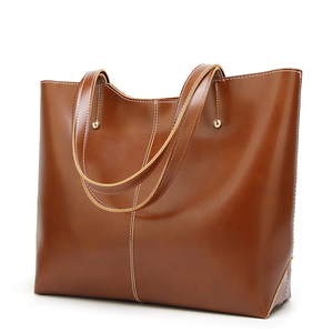 Bolso tote extragrande de cuero genuino con asas marrones, estilo minimalista de apertura superior para uso diario. - Product Image 2