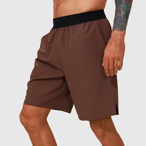 Short de sport pour homme en tissu tissé avec logo personnalisé Short de sport d'été personnalisé Vente en gros à séchage rapide pour homme - Product Image 1