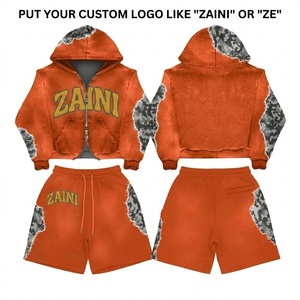 Ensemble décontracté streetwear pour homme : sweat à capuche et short en molleton de coton 320 GSM, avec empiècements camouflage et logo personnalisé imprimé sérigraphié, finition délavée pigmentée orange - Product Image 1