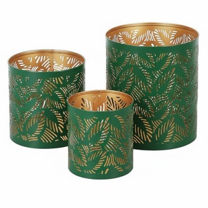 Portavelas cilíndricos de acero verde con diseño de hojas recortadas para decoración del hogar, hechos a mano y personalizados. - Product Image 1