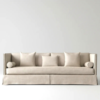 Canapé Ashford 3 places convertible gonflable de luxe moderne, avec dossier haut, structure en bois, revêtement en tissu mousse, garniture cloutée et coussins d'appoint