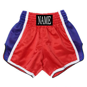 Shorts de Muay Thai personnalisés en satin blanc, jaune, bleu, avec maille élastique, logo OEM, patch logo et nom personnalisés - Product Image 2