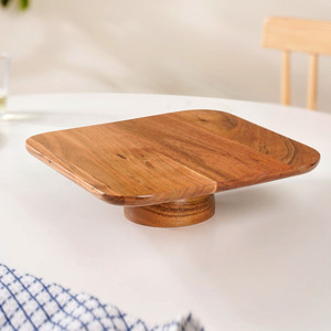 Elegant Wooden <b>Cake</b> <b>Stand</b> Crafted From Natural Wood Featuring A Smooth Square Platform And A Sturdy Pedestal Base For Serving - Product Image 1