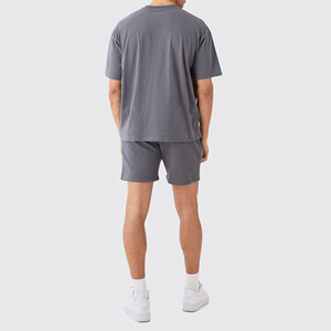 Nouveaux ensembles d'été pour hommes, ensembles décontractés à motifs, t-shirt ample avec short assorti, pantalon court de plage pour l'extérieur, ensembles de marque pour hommes 2027 - Product Image 1