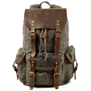 Meilleures ventes : Sacs à dos en cuir grande capacité pour l'université et l'école, sacs à dos en cuir véritable avec plusieurs poches latérales et frontales - Product Image 1