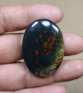 Jaspe de sangre de dragón natural, cabujón ovalado, negro, rojo, amarillo, verde, iridiscente, pulido, para la fabricación de joyas. - Product Image 3