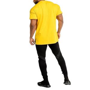 เสื้อยืดคอกลมแขนสั้นสีเหลืองสำหรับผู้ชาย ทรงปกติ สวมใส่สบาย ผ้าถัก 100% ผ้าฝ้าย ระบายอากาศได้ดี สีพื้นเรียบ ดีไซน์เรียบง่าย - Product Image 4