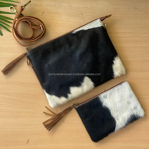Vente en gros OEM 2024 Nouveau design de sac à bandoulière à pompon en cuir de vachette et poil sur pochette à fermeture éclair en cuir de vachette véritable Ensemble pour femmes - Product Image 2