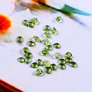 Lote al por mayor de gemas sueltas de peridoto natural de 5x7 mm, corte de pera rosa, cabujón de base plana para fabricación de joyas - Product Image 3