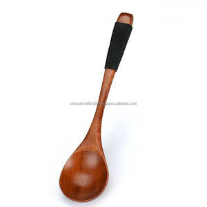 Cuillère à spatule en bois de mangue au design classique unique pour la décoration de la cuisine dans les occasions de mariage ou d'hôtel à la maison - Product Image 1