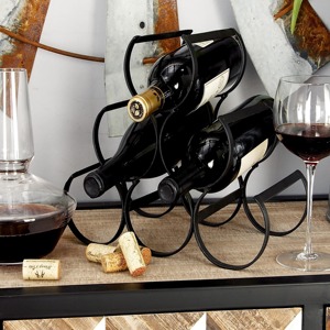 Elegante Exhibidor de Vino de Metal con Marco Abierto, Exhibición de Botellas Contemporánea - Product Image 1