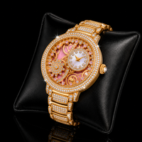 Montre de luxe pour femme à mouvement quartz squelette, boîtier en acier inoxydable, cadran en cristal rose, lunette étincelante et bracelet serti de cristaux