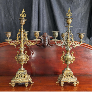 Elegant minimalist gold iron scrollwork dual candle stand holding two clear glass tealight cups. Available at wholesale price. - Product Image 6