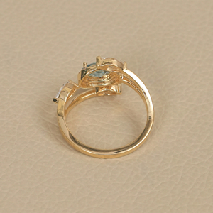 แหวนเพชรทรงโอวัลสีน้ำเงินแบบโอเพ่นริง ประดับเพชรแบบฮาโล ทองคำแท้ 14K แหวนเพชรแบบพันรอบ งานจิวเวลรี่ชั้นดี - Product Image 5