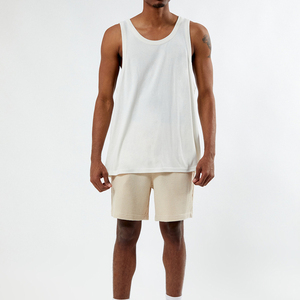 Camiseta sin mangas de algodón blanca para hombre, cuello redondo, informal, de punto, color liso, sin mangas - Product Image 1