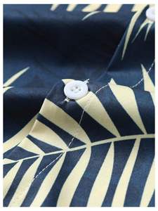 Conjunto de dos piezas con estampado de hojas tropicales para hombre, camisa de manga corta con botones y pantalones cortos con cintura elástica, conjunto ligero para la playa - Product Image 6