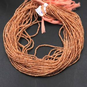 ลูกปัดมูนสโตนสีพีชธรรมชาติเคลือบเงิน คุณภาพสูง ขนาด 2-2.5 มม. รูปทรงรอนเดลล์ ความยาว 13 นิ้ว สำหรับทำเครื่องประดับ - Product Image 2