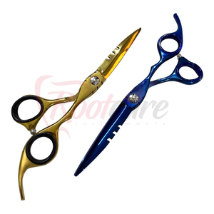 กรรไกรตัดผมดีไซน์ใหม่ทันสมัยขนาด 6.5 นิ้ว ลายฉลุเลเซอร์คมกริบ กรรไกรตัดผมแบบแบน สีน้ำเงินและสีทองเคลือบพลาสม่า - Product Image 1