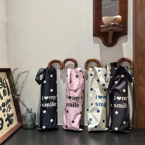 Sombrilla Plegable con Protección UV y Revestimiento Negro, Estilo Coreano con Diseño de Puntos, Portátil con Bolsa de Transporte - Product Image 1
