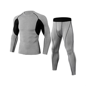 Conjunto de compresión gris de manga larga para hombre, cuello redondo, de secado rápido, de spandex y poliéster, top de manga larga y pantalones, kit sólido para todas las estaciones - Product Image 1