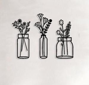 Décoration murale en métal accrocheuse pour un intérieur contemporain, sculpture murale élégante en fer forgé. - Product Image 4