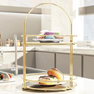 Élégant présentoir cosmétique rond à double couche pour comptoir, finition dorée et poignée de transport - Product Image 1