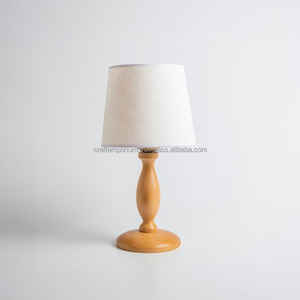 handcrafted table <b>lamps</b> made of carved wood with hand-polished surfaces and artistic lampshades for upscale interior lighting. - Product Image 1