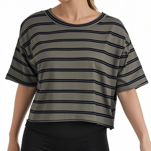 T-shirt décontracté uni à col rond en coton et polyester pour femme, manches courtes, coupe courte, collection 2026 – Vente en gros - Product Image 1