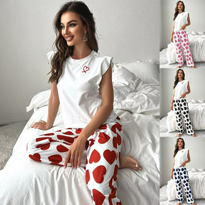 Pyjama d'été 2 pièces pour femme en soie de lait, avec t-shirt blanc à manches volantées et pantalon imprimé cœurs, col doux et taille élastique - Product Image 6